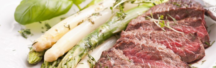 Grilled rib eye of beef with giant white asparagus and oyster butter sauce